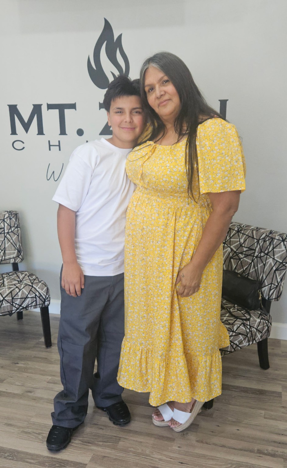 A mother and her son together at Mt. Zion
